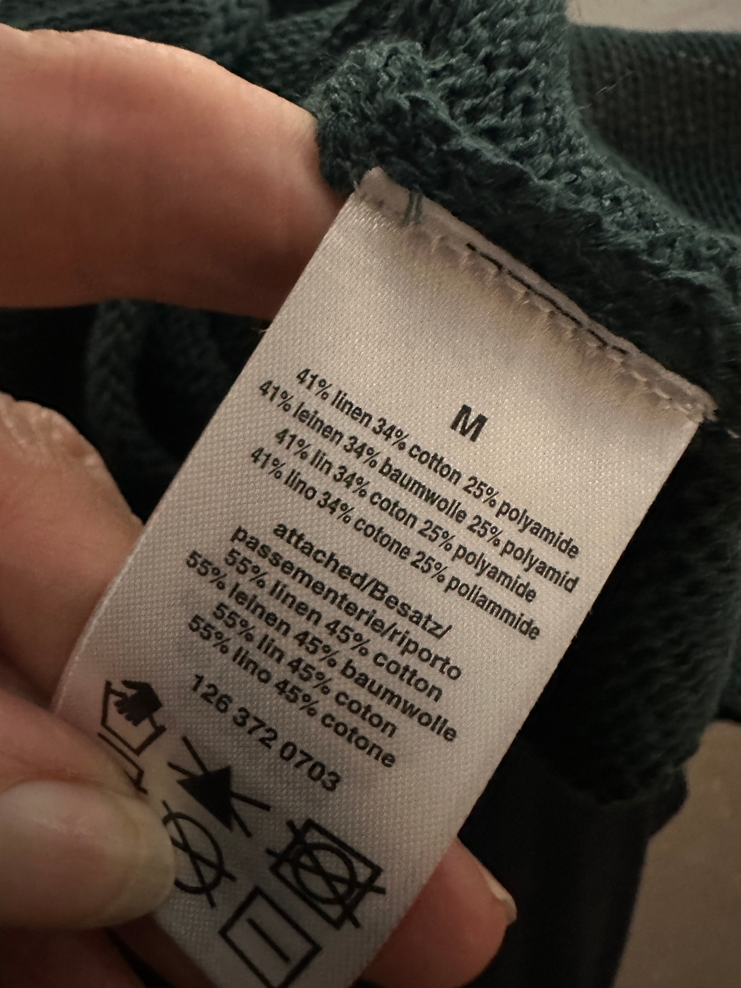 Black Label jumper in tree