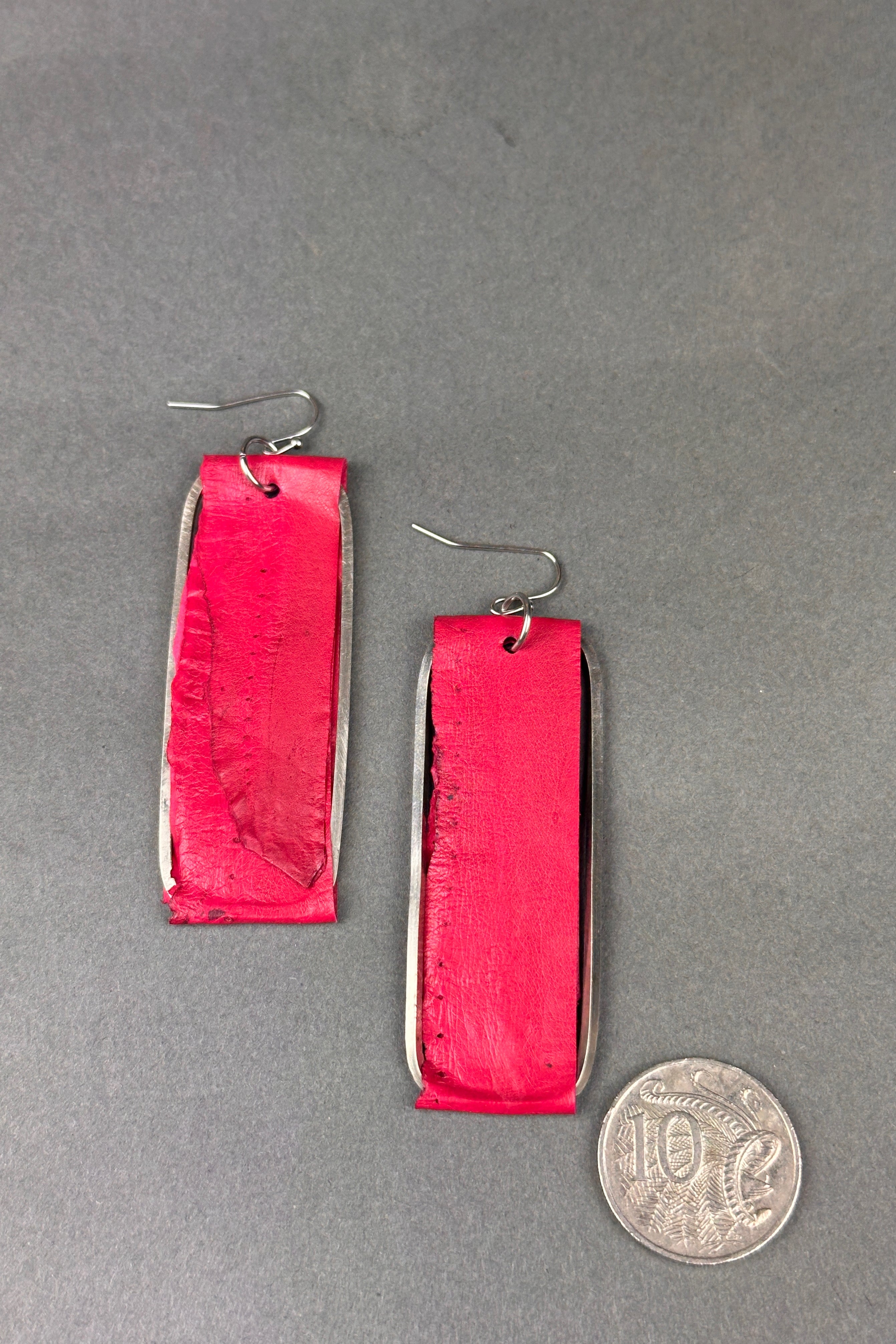 Marija Bajovska eel skin earrings in fuchsia