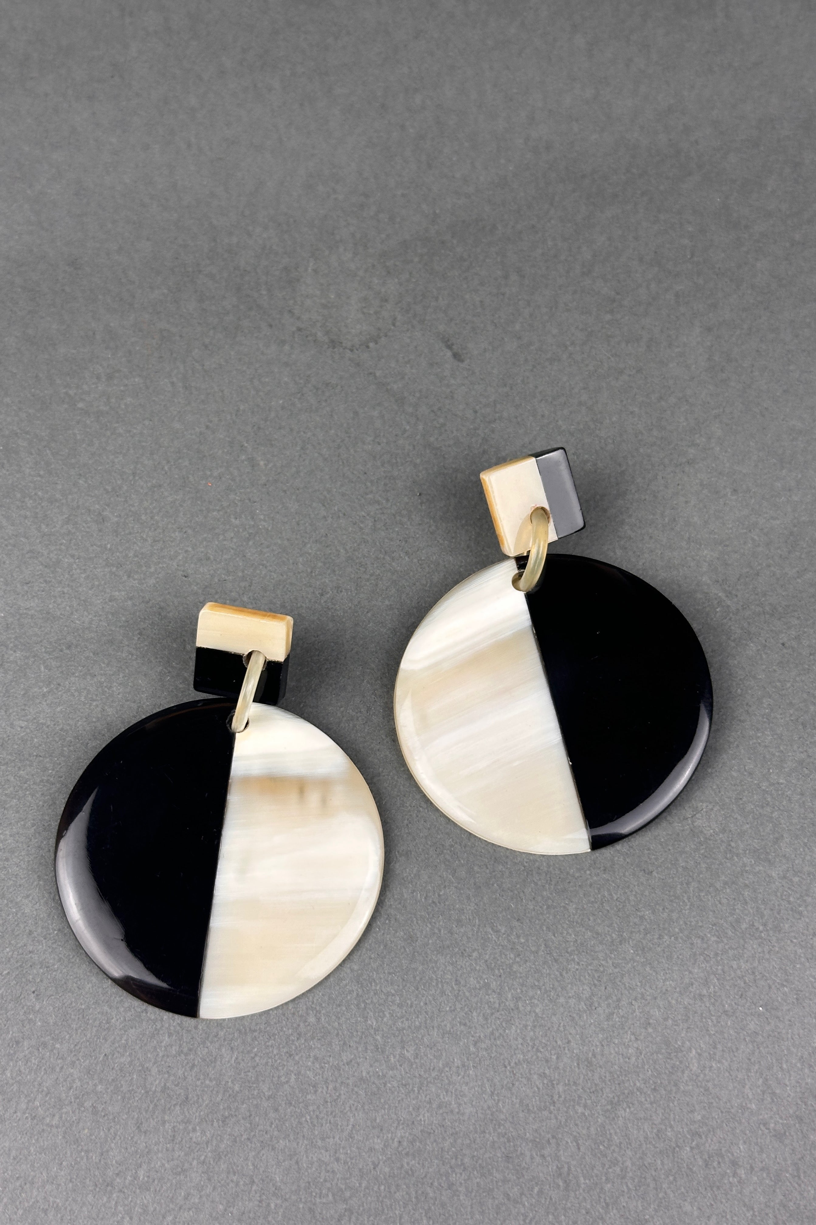Soyang cream and black round horn earrings